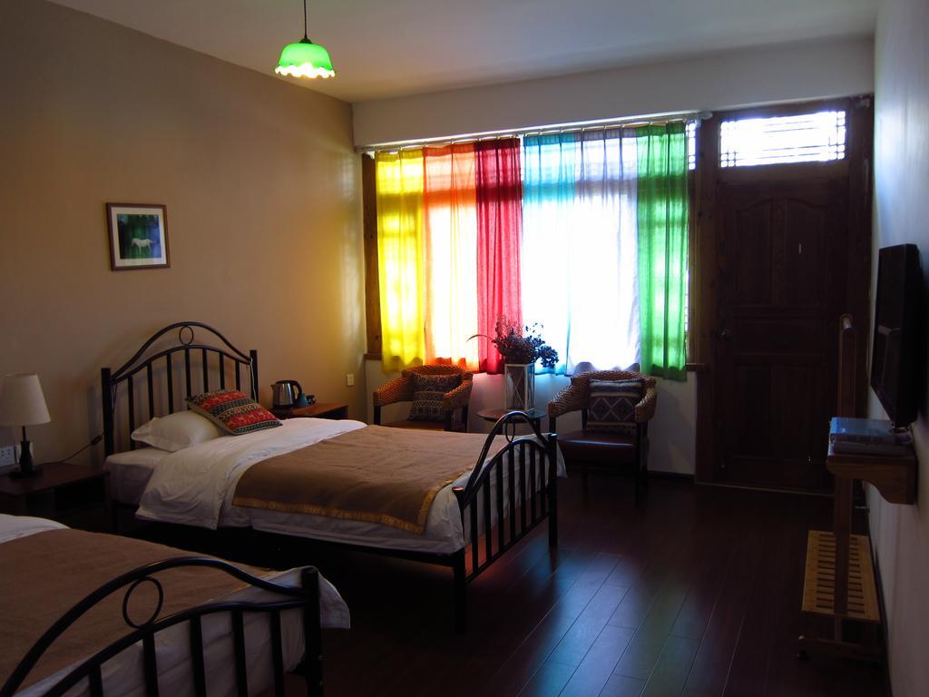 Lijiang Baisha There International Youth Hostel Room photo